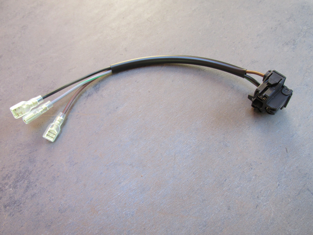 Headlight plug. Applicable to the Moto Guzzi V65.