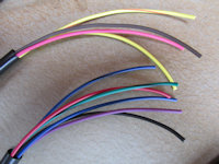 Pigtails that will have to be connected to your existing terminals and housings.